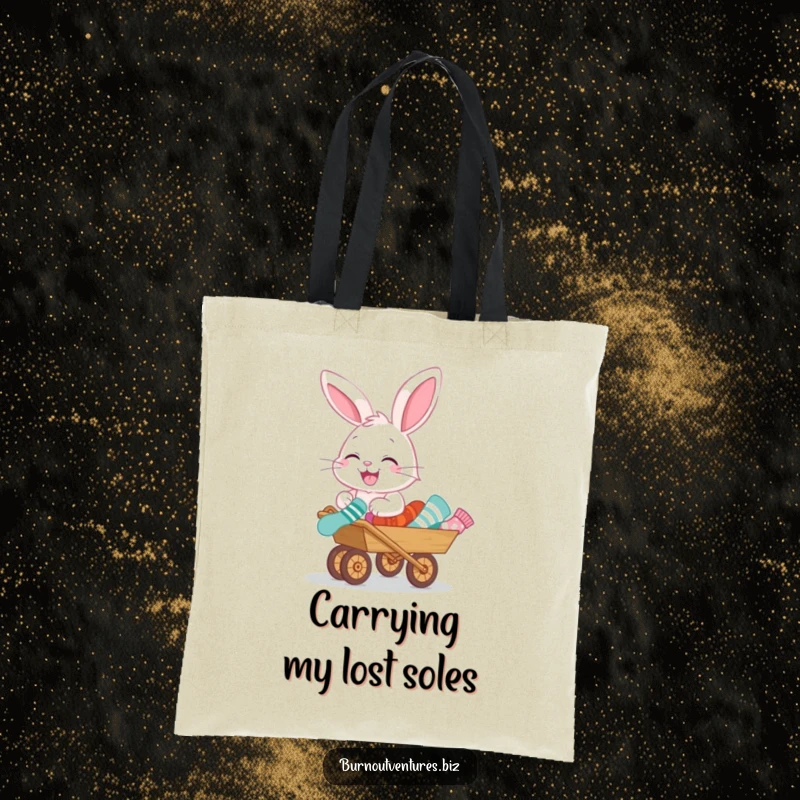 Funny tote bag displaying a giggling bunny pushing a miniature wheelbarrow full of mismatched socks, a delightful and humorous accessory.